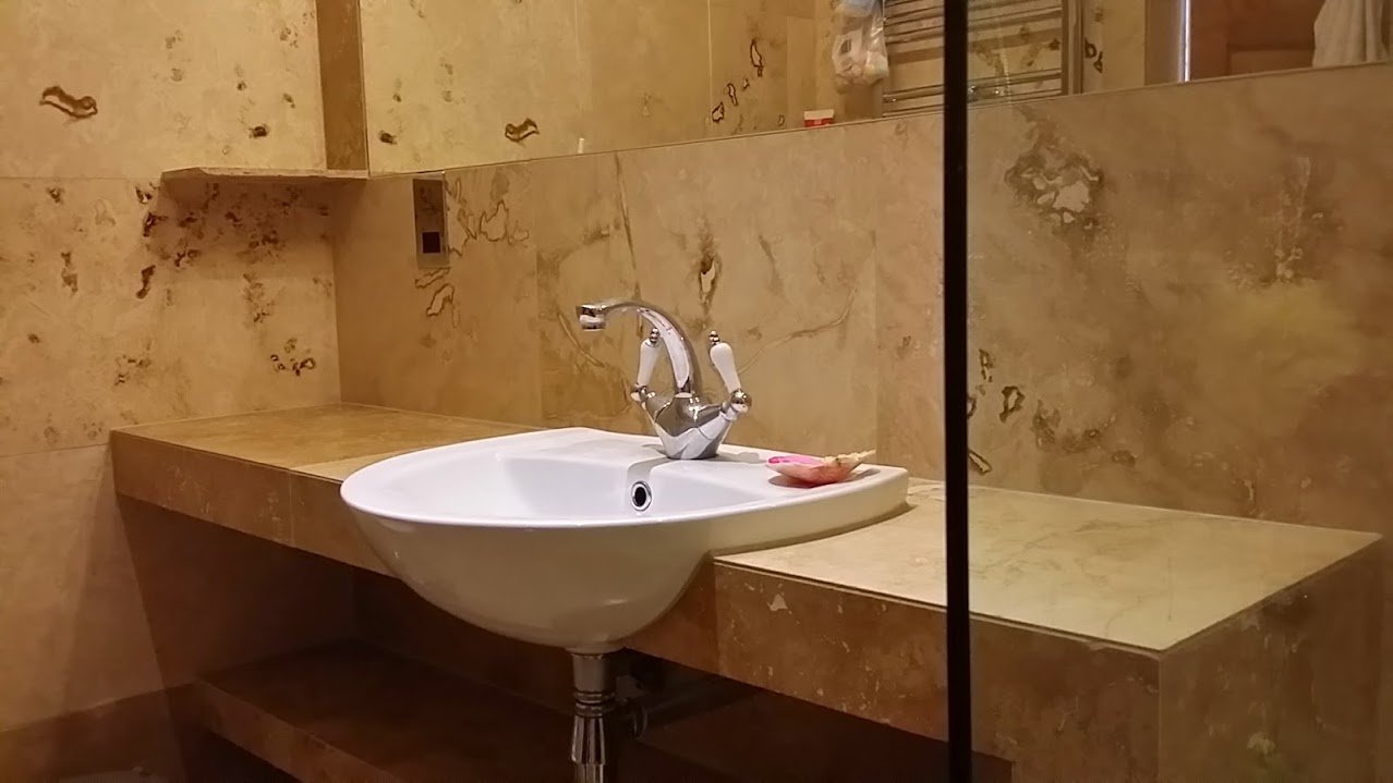 A1 Group - Travertine shower room installation – Duddingstone Vilige Edinburgh
